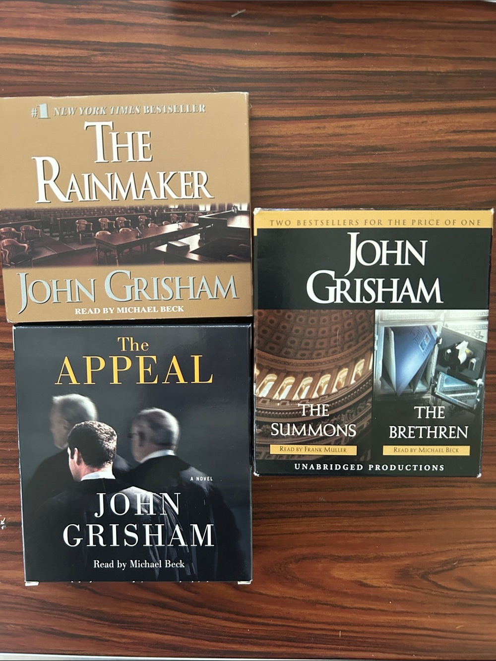 4 John Grisham Books on DVDs